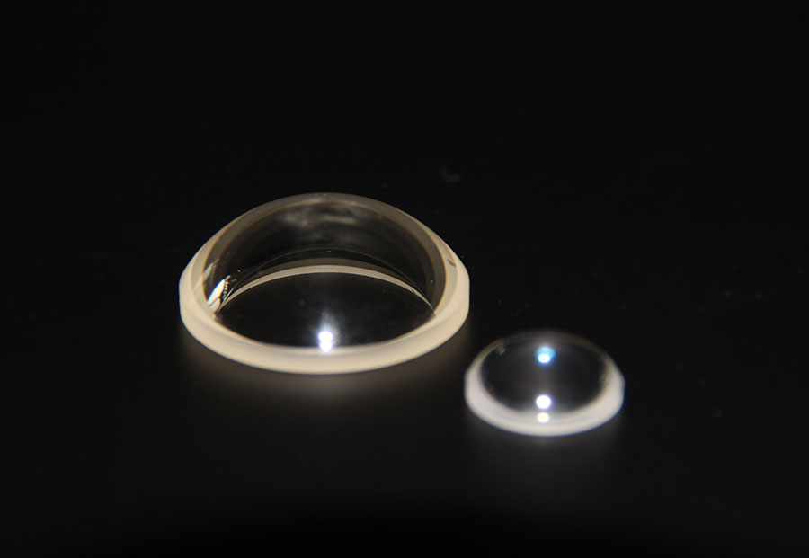 Positive meniscus lenses